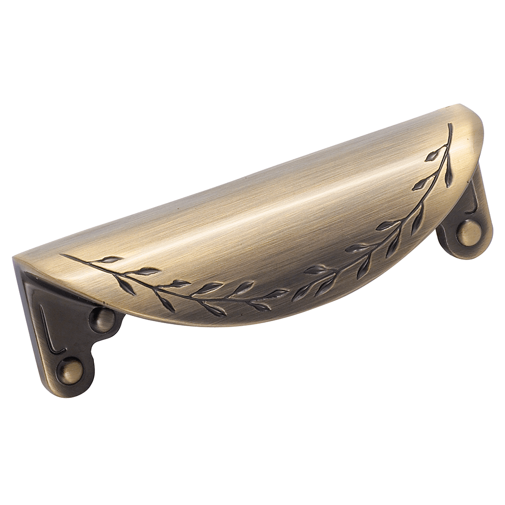 A close-up of an Oil-Rubbed Bronze Nature's Splendor Cup Pull with a leaf design.