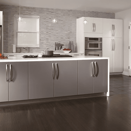 Satin nickel 5-1/16" Essential''Z arch pull on cabinet door