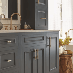 Close-up of Amerock St Vincent T-Bar Pull in Black Bronze on Cabinet Drawer