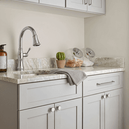Amerock Factor Collection Polished Chrome Handle Pull on Wood Cabinet