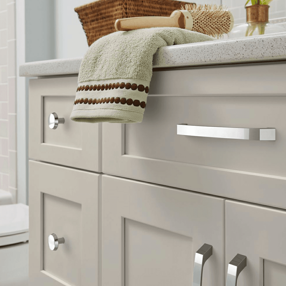 Amerock Premise Mushroom Knob in Matte Black Finish on Marble Surface