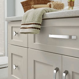 Amerock Premise Mushroom Knob in Matte Black Finish on Marble Surface