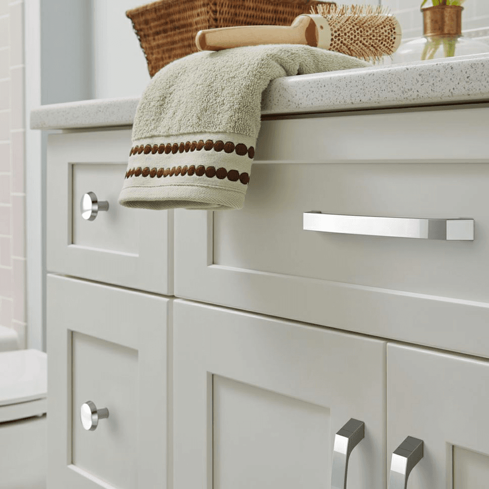 Amerock Premise Cabinet Pull in Satin Nickel on Blue Background