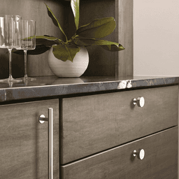 Amerock Radius Satin Nickel Knob on Blue Cabinet Door with White Hardware