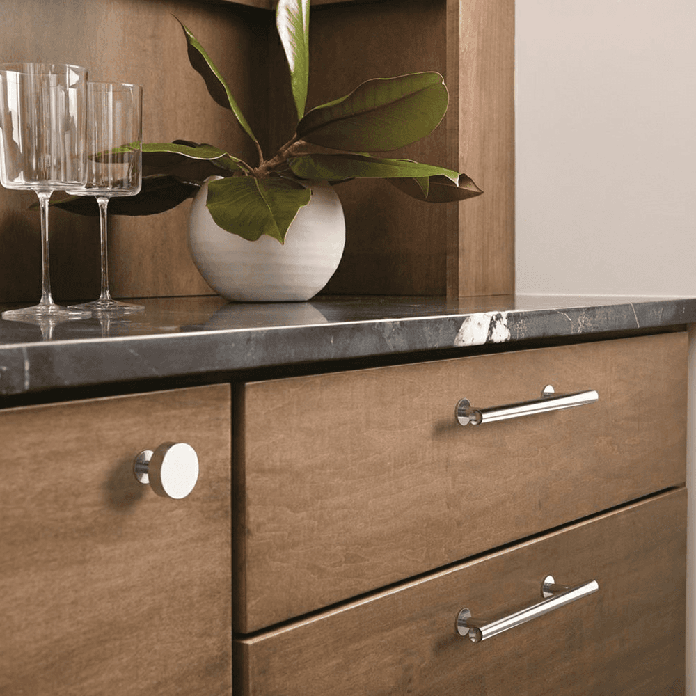Amerock Radius Satin Nickel Knob on Dark Wood Cabinet Door