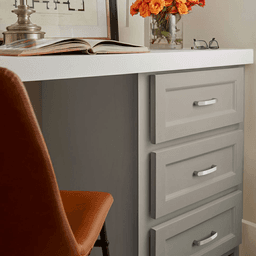 Contemporary Amerock Rift Handle Pull in Polished Chrome on Gray Background