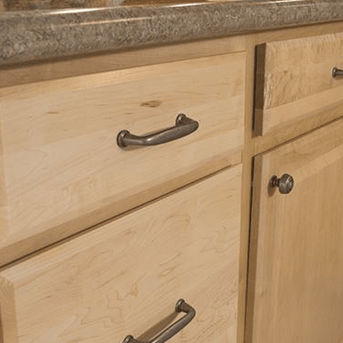 Weathered Nickel 160mm Kane Handle Pull by Amerock on a Dark Cabinet