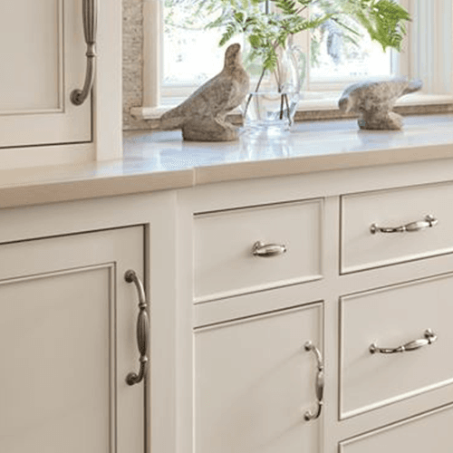 Amerock Satin Nickel 8" Blythe Appliance Pull on a dark wood cabinet