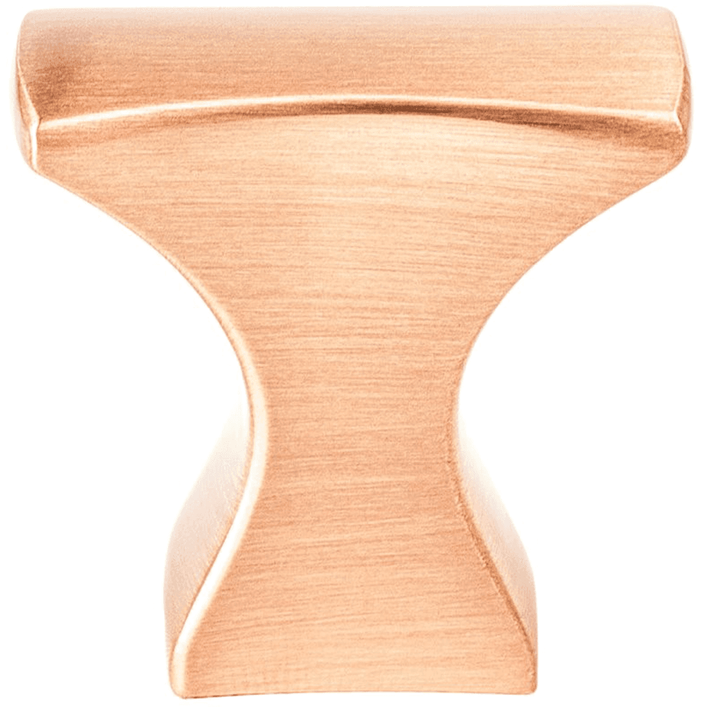 Lustrous hour glass profile of Berenson Hardware's 1-1/4" Aspire Curve Knob in Brushed Copper