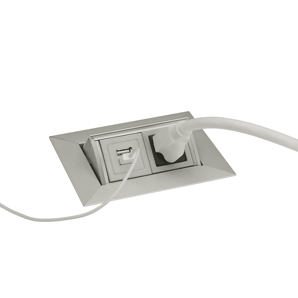 Small black pop-up power grommet with power and USB outlets by Doug Mockett And Company Inc