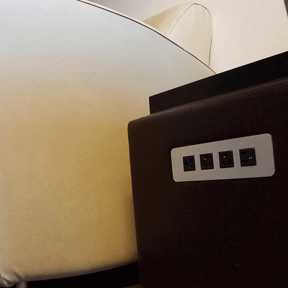 ETL listed black flush power grommet with 4 power outlets and ADA compliance