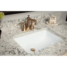 Karran Vitreous China Undermount Sink in Bisque color on marble countertop