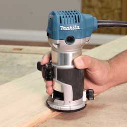 Makita compact router on wood surface