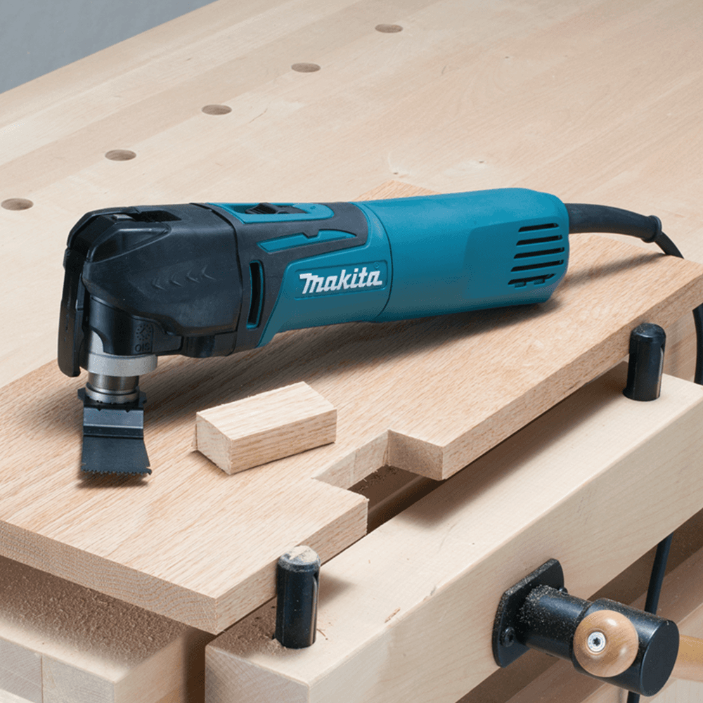 Multi-tool adapter with clamp system for easy installation of accessories