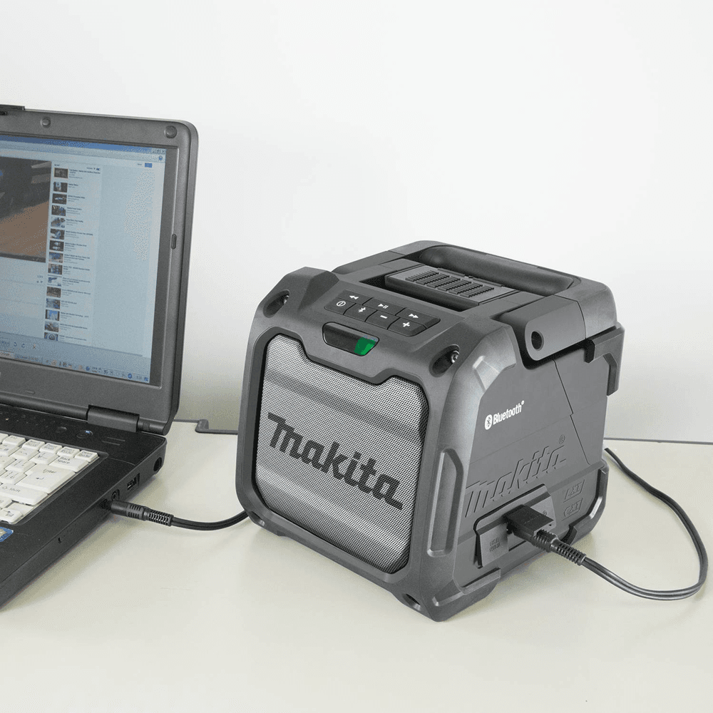Makita XRM08B Feature Shot aux port.jpg