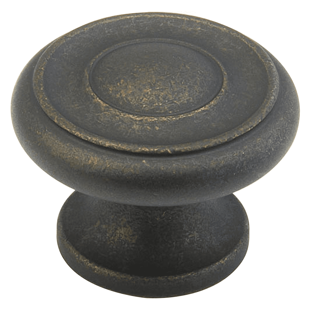 Close-up of Schaub & Co 1-1/2" Round Knob Distressed Bronze on Wood Cabinet