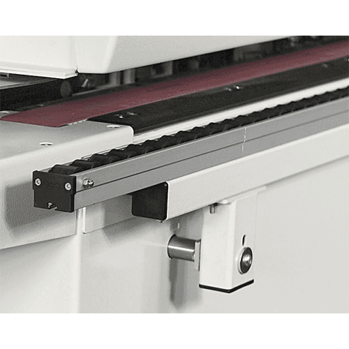 Scm Group's Edgebander with top thick steel pressure beam and rubber-coated wheels