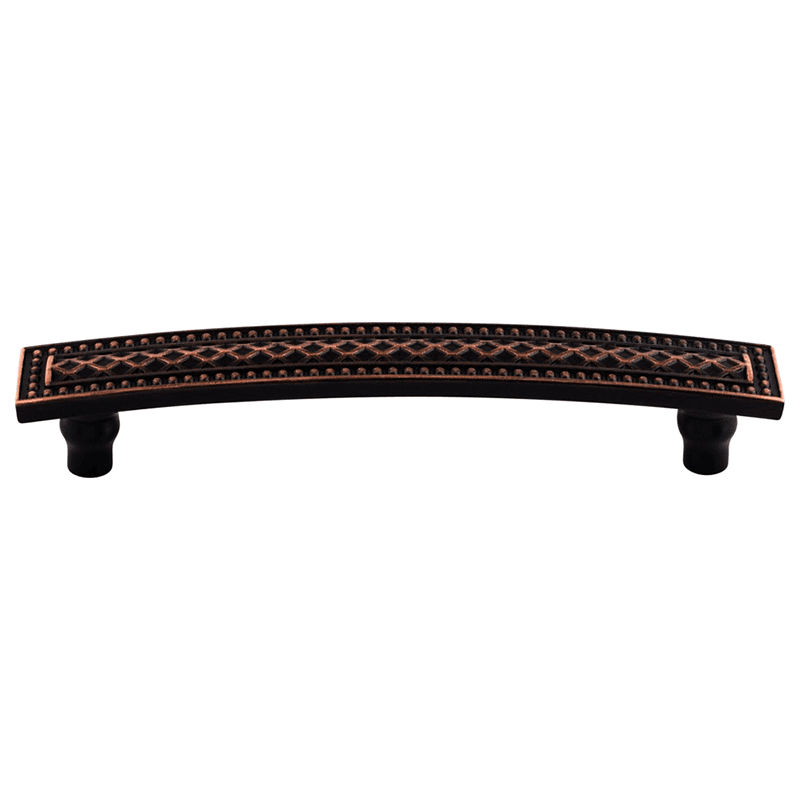 Close-up of Trevi Tuscan Bronze pull on wood cabinet