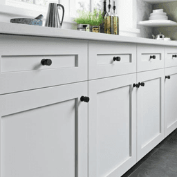 Serene Lily Knob in Flat Black Top Knobs
