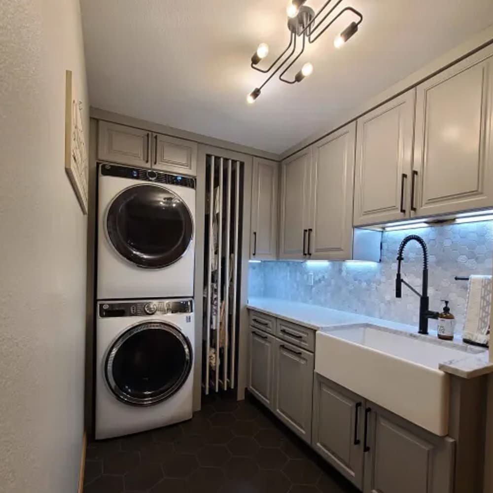 DryAway pullout cabinet drying system in retracted position showing space-efficient laundry room organization
